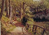 Peder Mork Monsted Canvas Paintings - The forest path